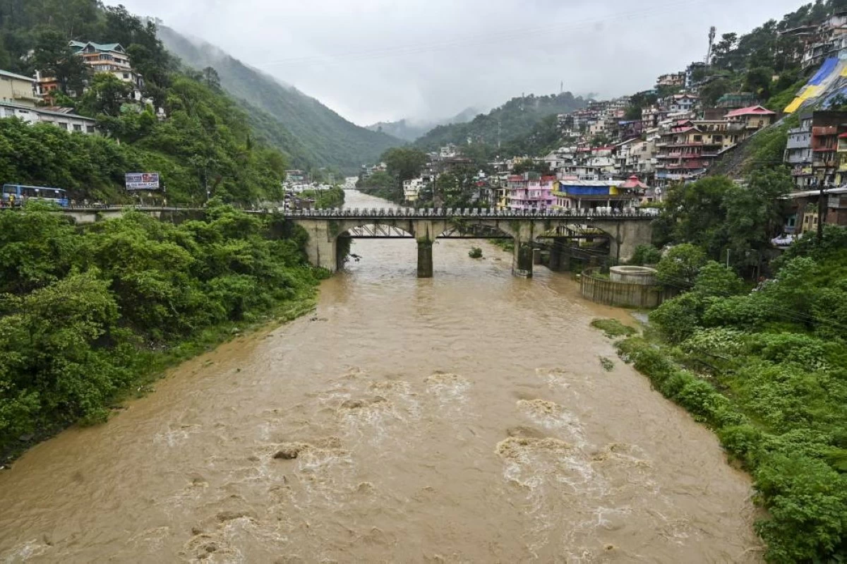Suketi River in spate following heavy rainfall Himachal's Mandi (PTI image)