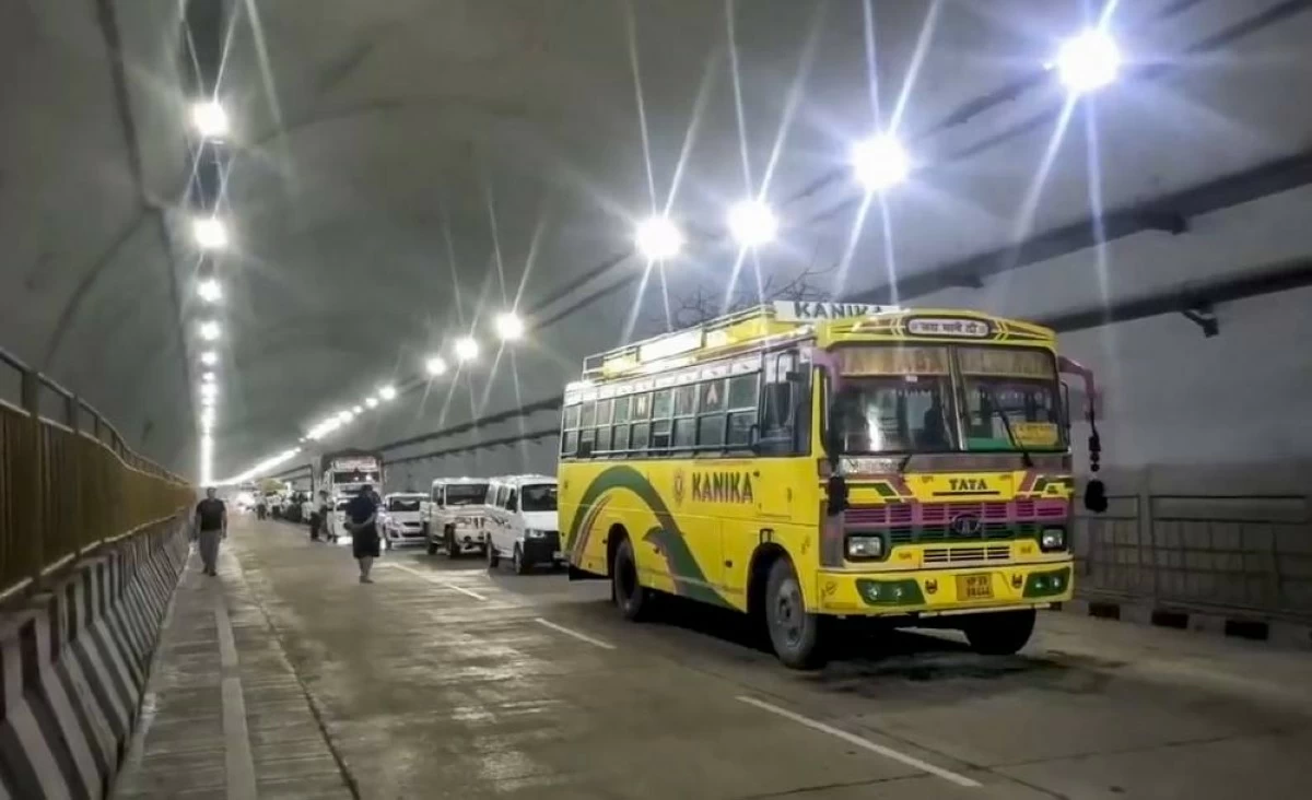 Vehicles stuck in a tunnel on the Kiratpur -Manali highway after its exit was blocked due to landslide near Mandi, HP on Monday (PTI image)