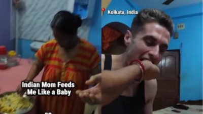 Indian_mom_feeds_American_vlogger_with_her_hands;_video_touches_hearts