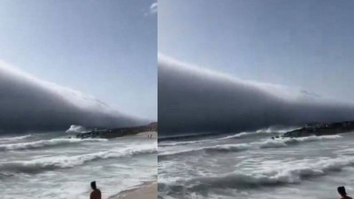 Beachgoers in Portugal witnessed a massive roll cloud.