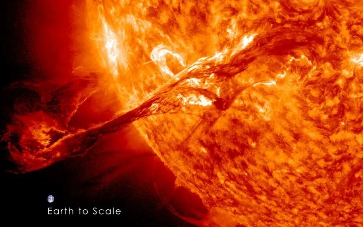 A filament eruption with the Earth for scale. (Image Credit: NASA). 