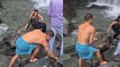 Foreign tourist picks up litter in Himachal Pradesh.