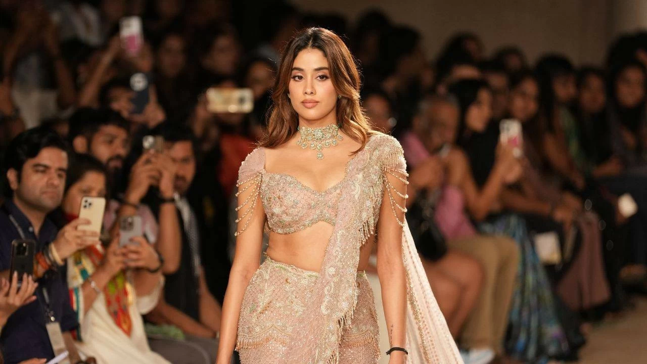 She wore a blush pink lehenga featuring beads, sequins, and detailed threadwork, exuding modern elegance with traditional flair.
