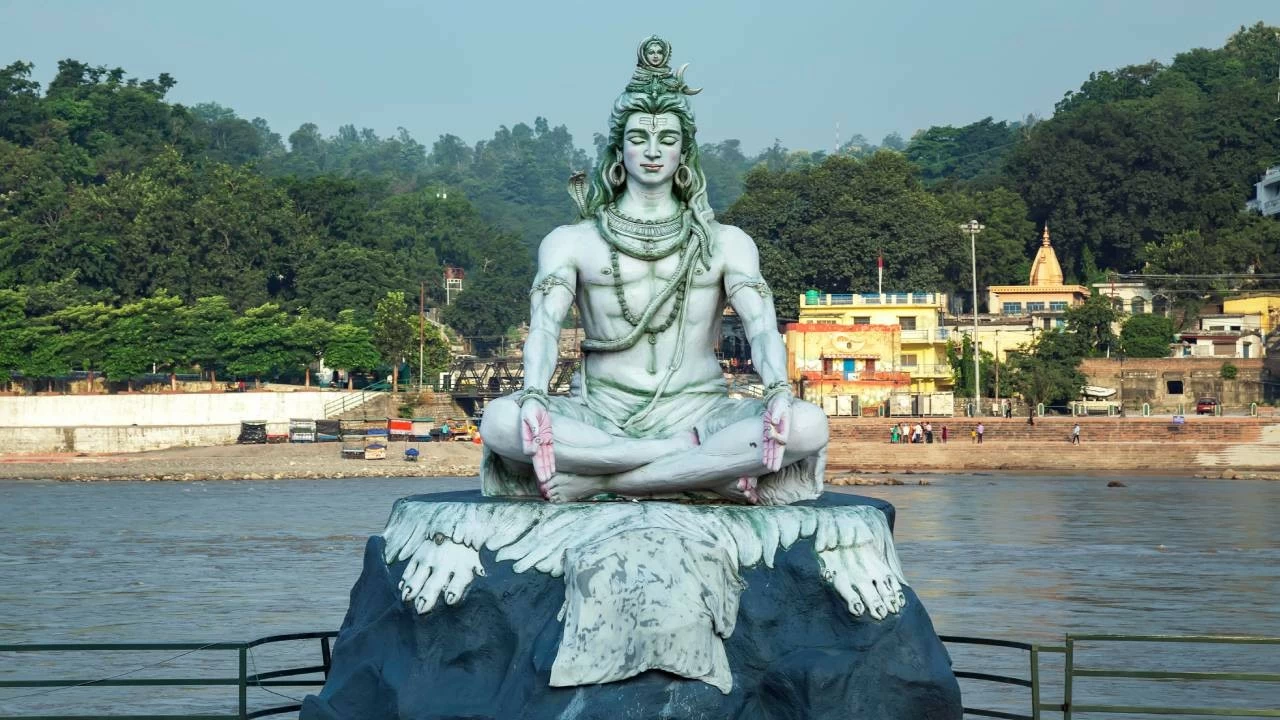 Lord Shiva is depicted with powerful symbols like the third eye, trishul, damru, and Ganga flowing from his hair — each representing divine qualities and universal truths. 