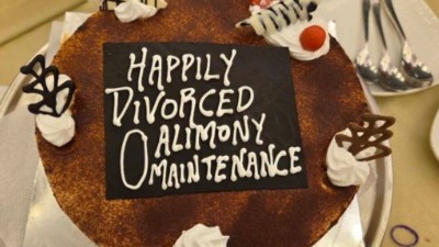 Man divorced with zero alimony celebrates with cake.