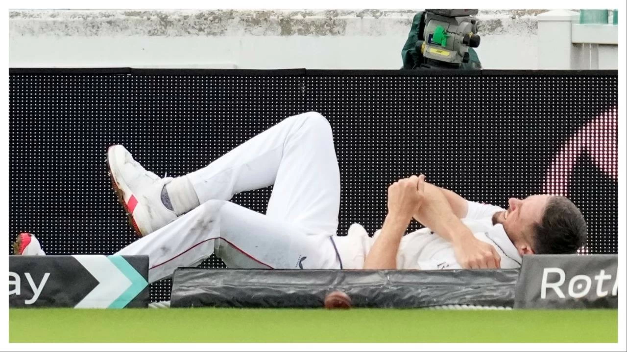Chris Woakes reacts after his left shoulder got injured while fielding the ball during the first day of the fifth Test cricket match between India and England, at The Oval, in London, England, Thursday, July 31, 2025.