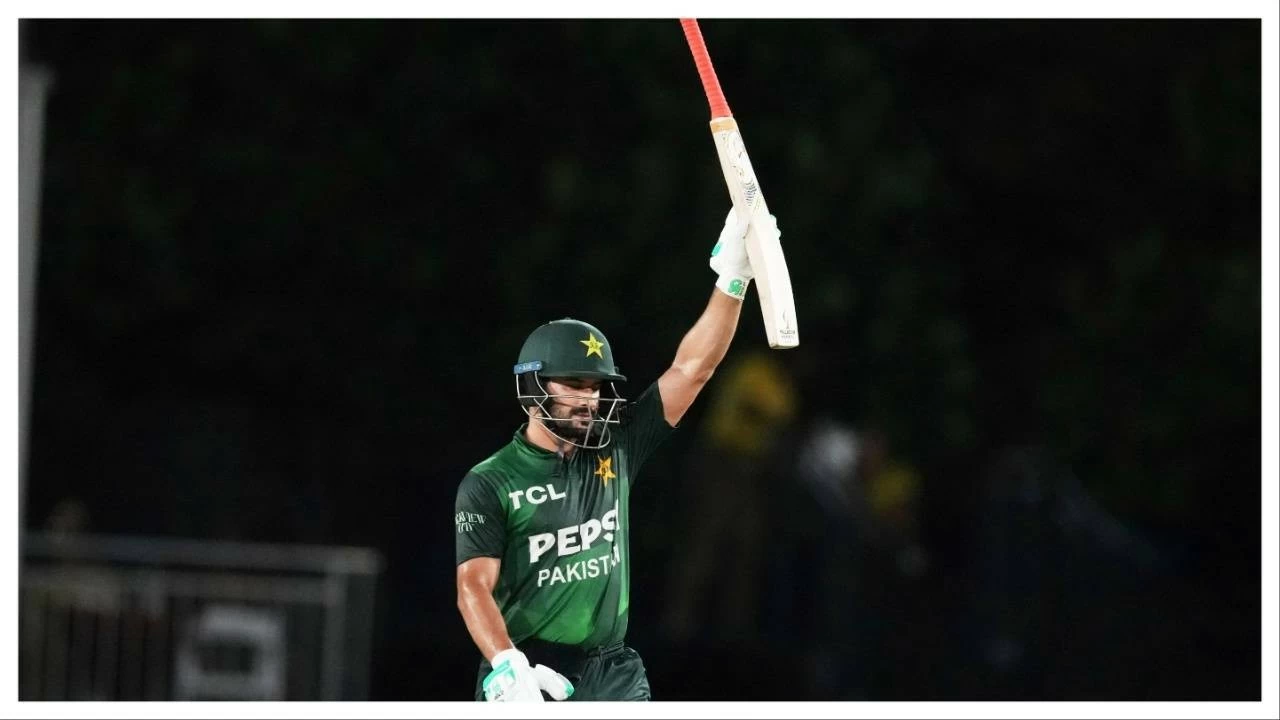 
Pakistan's Sahibzada Farhan raises his bat after reaching a half century during the third Twenty20 cricket match against the West Indies, Sunday, Aug. 3, 2025, in Lauderhill.