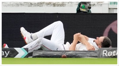 Chris Woakes reacts after his left shoulder got injured while fielding the ball during the first day of the fifth Test cricket match between India and England, at The Oval, in London, England, Thursday, July 31, 2025.