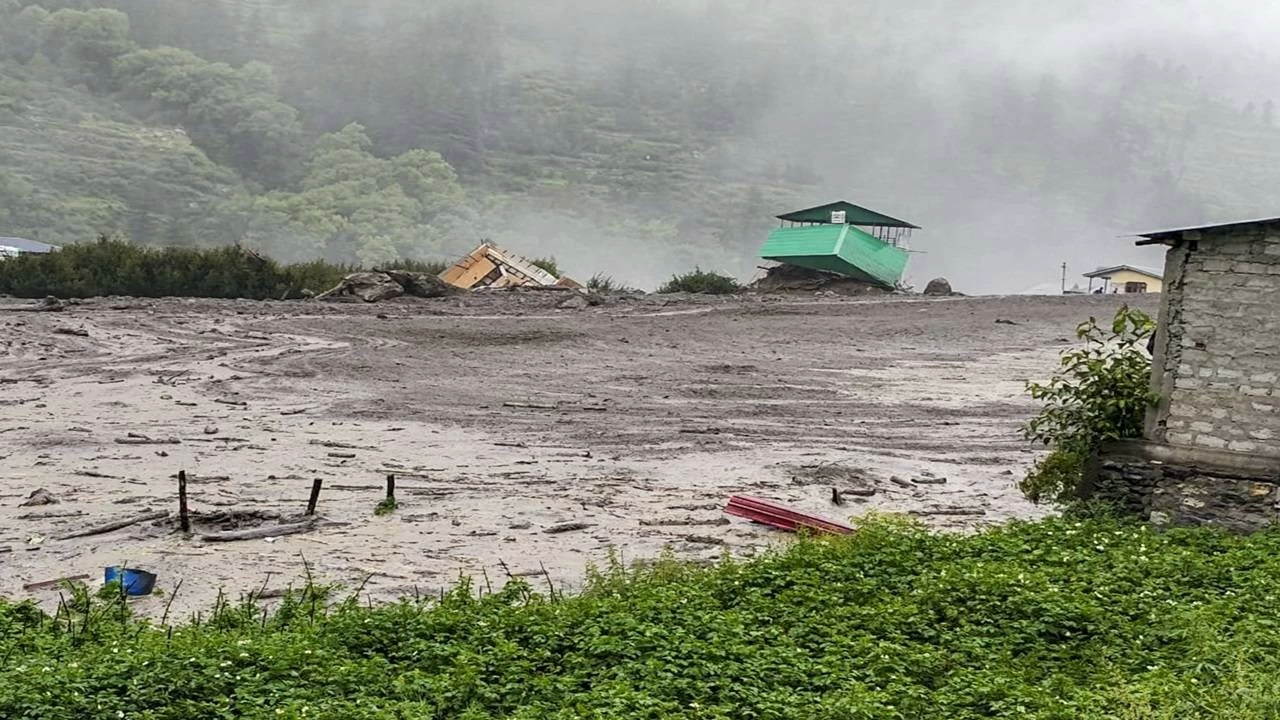 Houses and other structures being swept away in flash floods triggered by a cloudburst at Kheer Gad area in Dharali of Uttarkashi district, Uttarakhand.