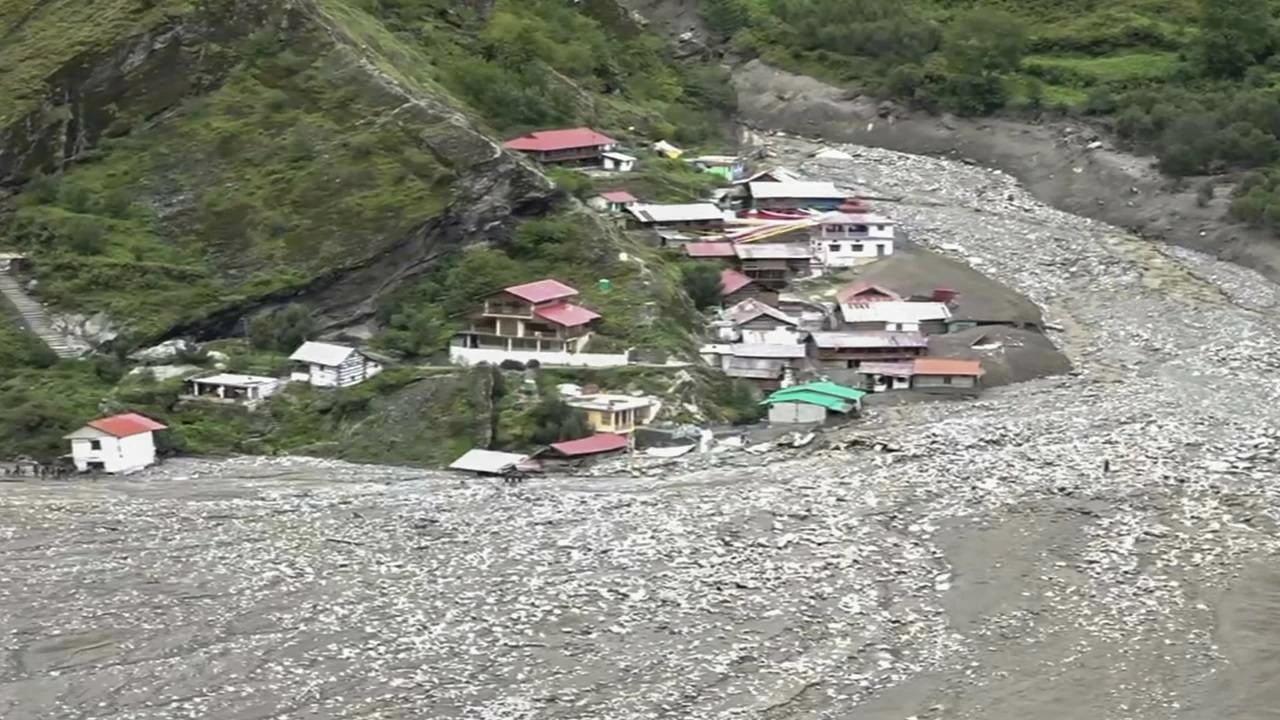 Houses buried under debris following flash floods, in Uttarkashi district, Uttarakhand, Wednesday, Aug. 6, 2025.
