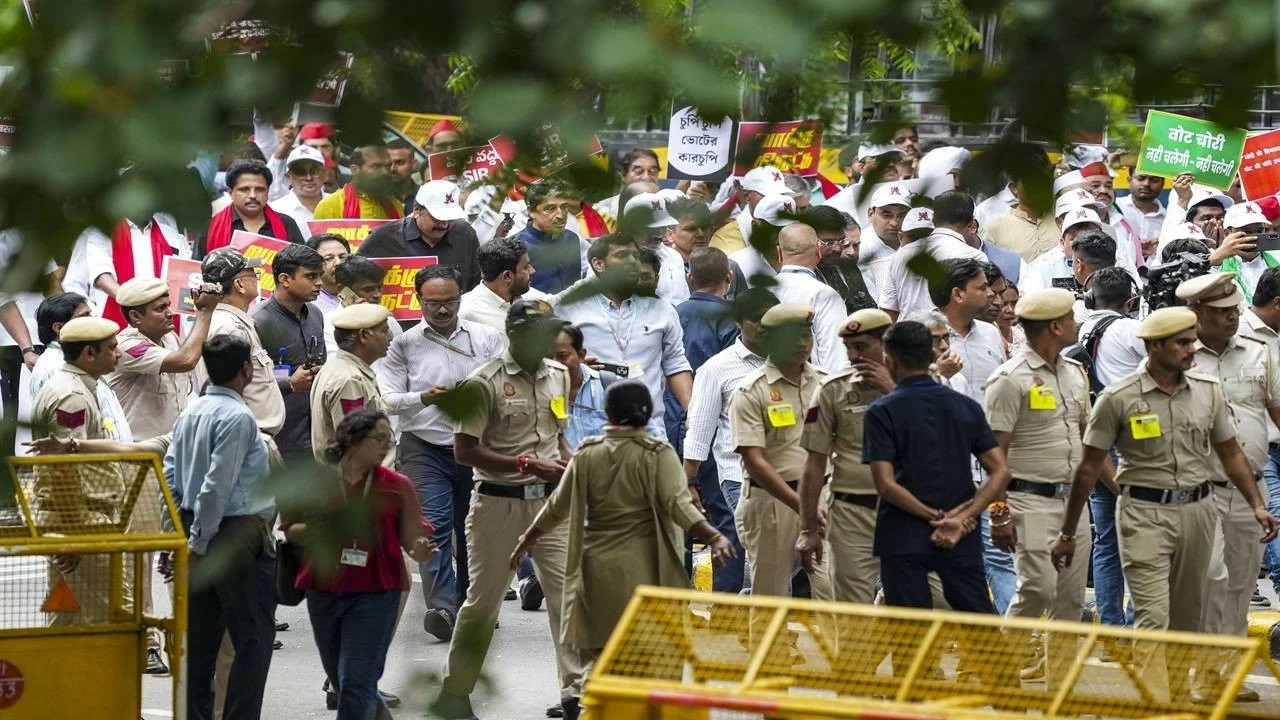 Security personnel keep vigil as opposition INDIA bloc MPs hold a protest march from Makar Dwar of Parliament to the Election Commission of India office over the poll fraud issue, in New Delhi  Monday. (Pic: PTI)