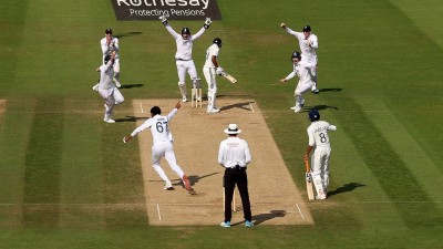 Shoaib Bashir of England celebrates taking the wicket of Mohammed Siraj. 
