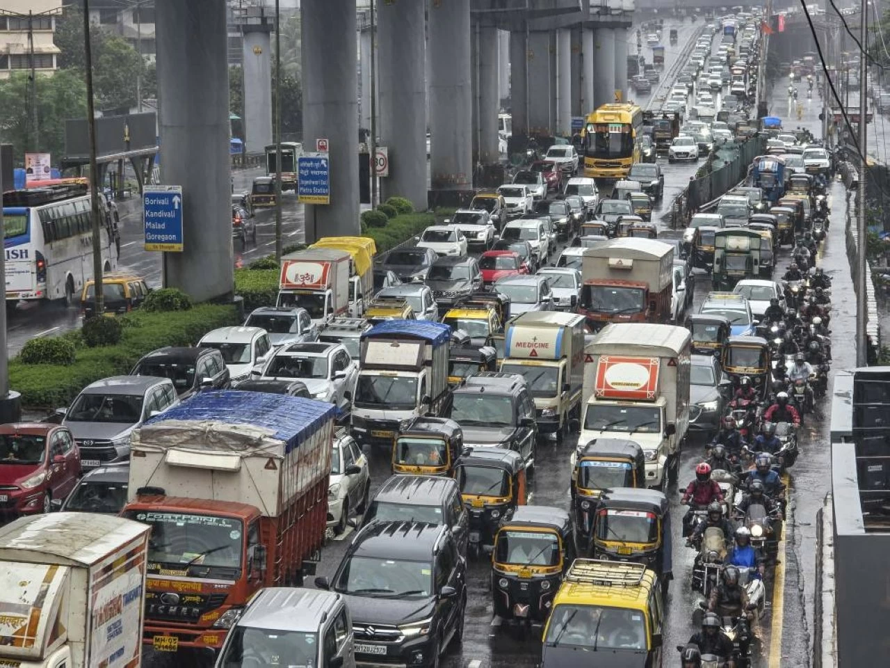 Commuters had to face severe traffic jam on Western Express Highway amid heavy rainfall in Mumbai on Monday. (PTI) 