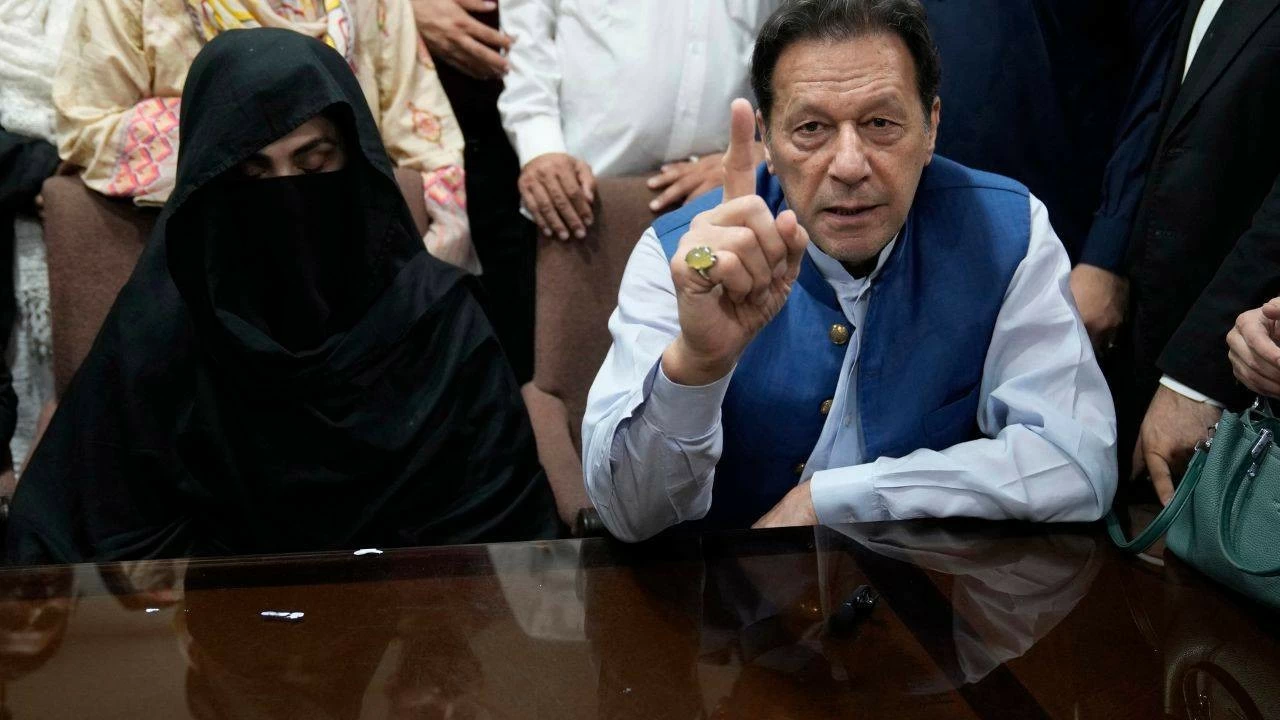 File photo of Pakistan&#039;s former Prime Minister Imran Khan, right, and Bushra Bibi, his wife 