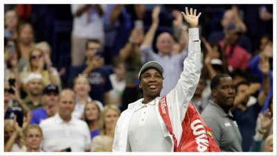 Venus Williams waves to fans after her first round of the US Open on Augist 25 in New York.