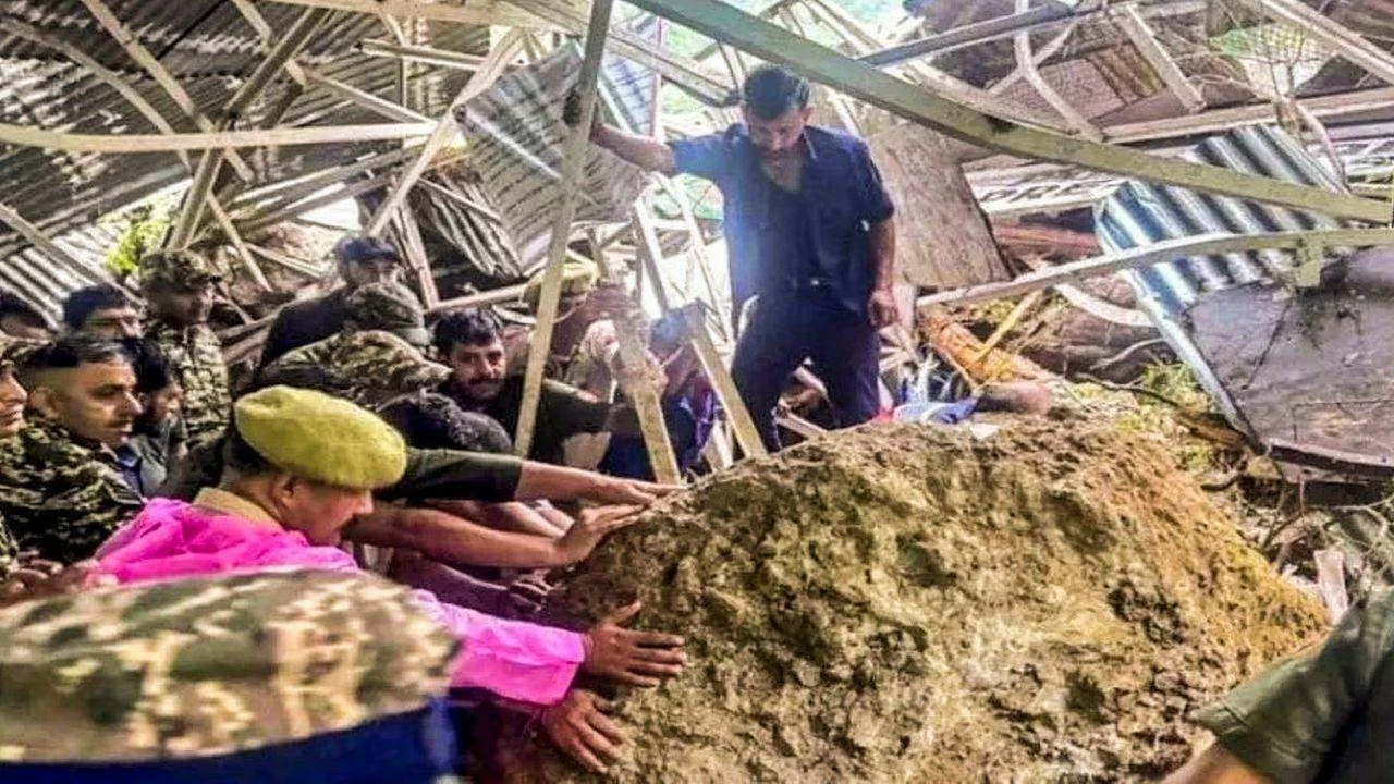 Security personnel at the site of the landslide on route to Vaishno Devi shrine, in Katra of Reasi district