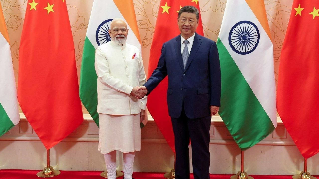 PM Modi shakes hands with Chinese President Xi Jinping during a meeting in Tianjin on Sunday
