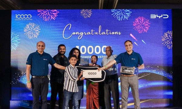 (Right to Left) Mr. Rajeev Chauhan (VP, Electric Passenger Vehicle, BYD India), 10,000th Customer of BYD India (Electric Passenger Vehicle), &amp; Mr. Shrirang Joshi (AVP, Electric Passenger Vehicle, BYD India)