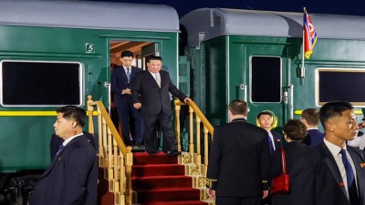 North Korea's leader Kim Jong Un walks out of his train after arriving at the North Korea-Russia border in Khasan, some 125 km south of Vladivostok, Russia, on September 12, 2023. (Photo by Primorsky Krai APS/Anadolu Agency via Getty Images)