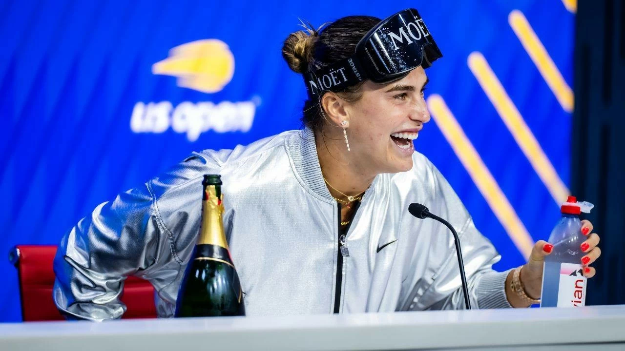 US Open champion Aryna Sabalenka turns up in a fun mood at the press conference.