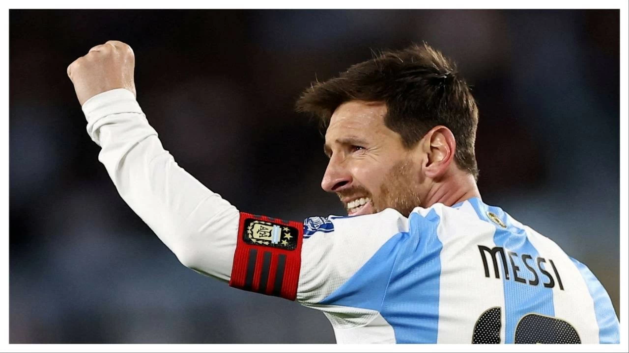 Argentina's Lionel Messi celebrates scoring their third goal against Venezuela.