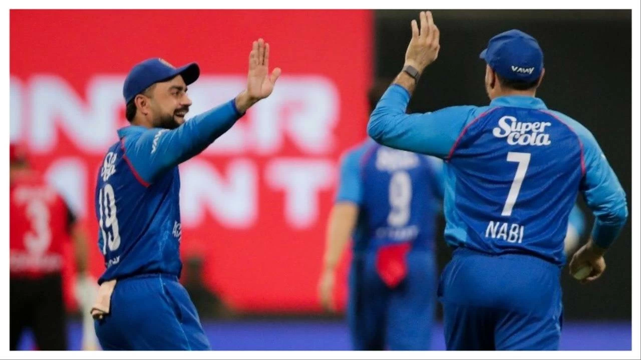 Afghanistan's Rashid Khan (left) celebrates on Tuesday.
