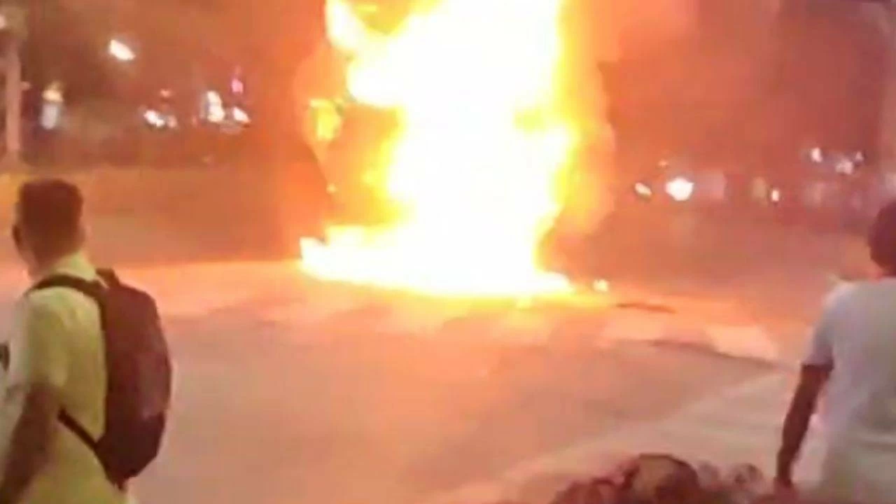In the aftermath, the enraged crowd set the out-of-control truck on fire.