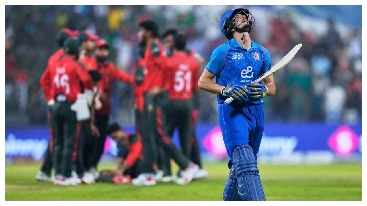 Afghanistan&#039;s Sediqullah Atal walks off the field in their Asian Cup match against Bangladeshon Tuesday.