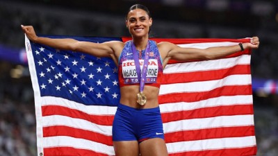 Sydney McLaughlin-Levrone of the U.S. celebrates after winning the gold medal