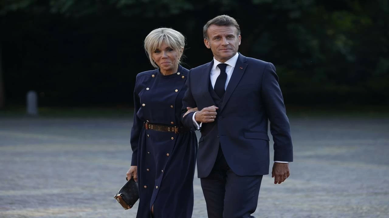 French President Emmanuel Macron's wife Brigitte are expected to present pictures in US court showing the First Lady pregnant and bringing up her children.(Photo: Omar Havana/Getty Images)