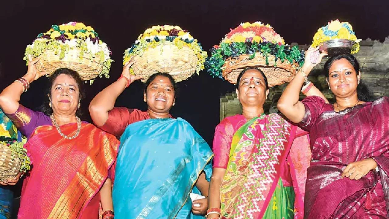 Ministers Seethakka, Konda Surekha participate in the inaugural Bathukamma event in Warangal on September 21, 2025. 