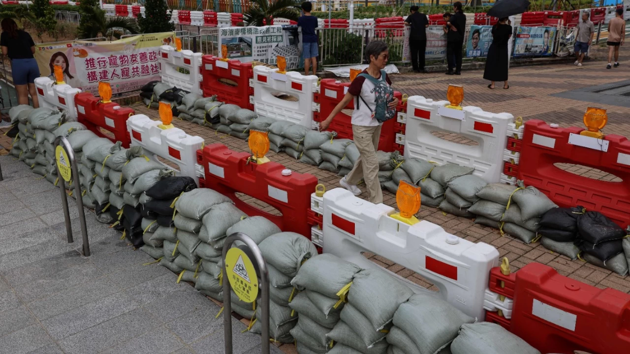 Sandbags are placed on the roads to prevent flooding from Super Typhoon Ragasa