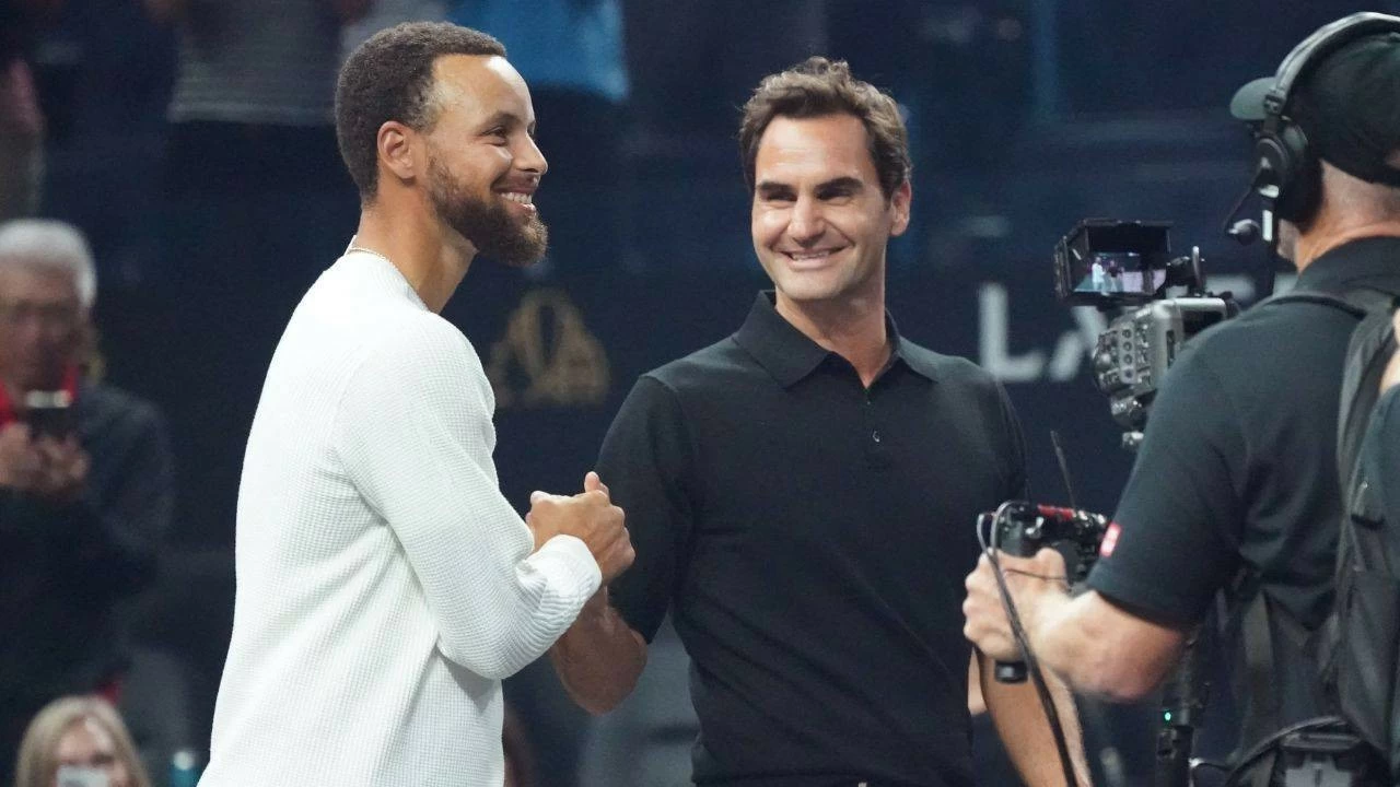 Stephen Curry and Roger Federer before the coin toss at the Laver Cup at Chase Center. 