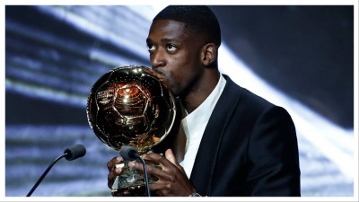 
Paris St Germain's Ousmane Dembele celebrates after winning the men's Ballon d'Or award. 
