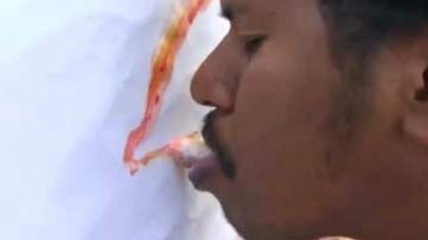 Kerala teacher paints stunning portraits using only his tongue