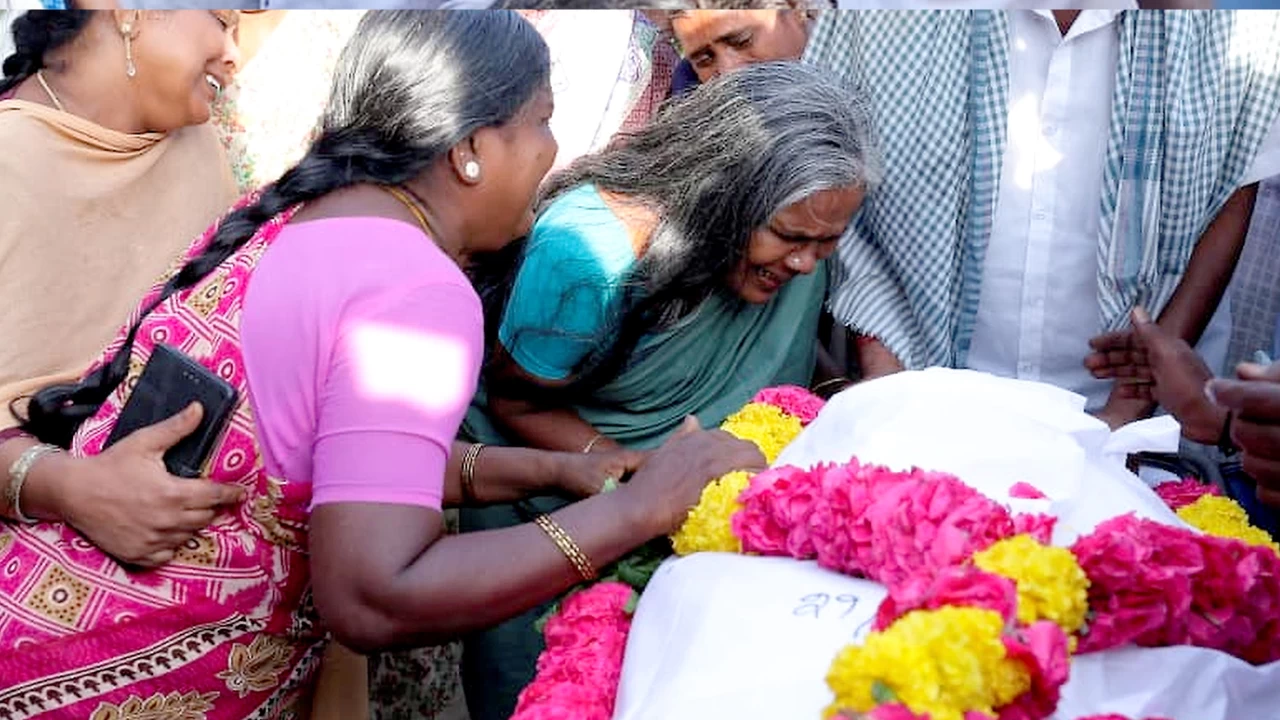 Bereaved family members and relatives of victims mourn outside the mortuary at a government hospital