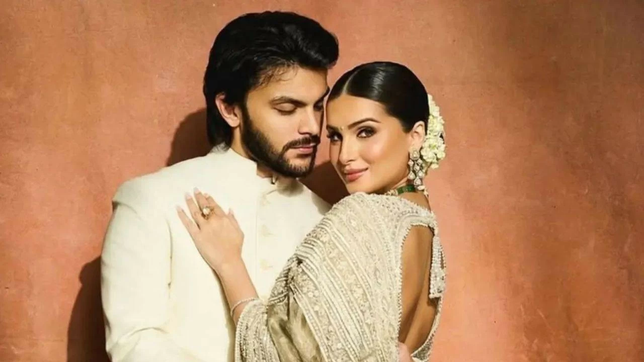 Veer Pahariya blows a kiss to Tara Sutaria during ramp walk