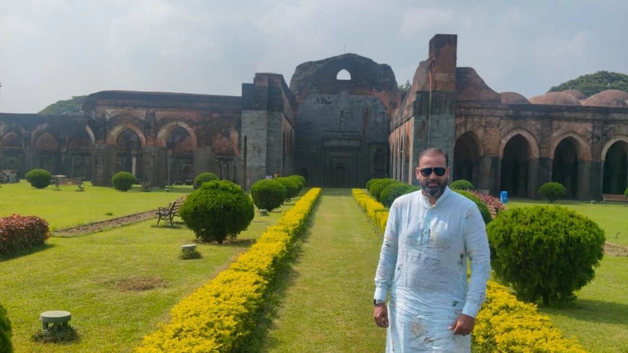 Former Indian cricketer and Trinamool Congress MP Yusuf Pathan in front of the historic Adina Mosque. (Photo credit: X)