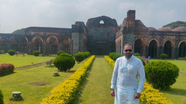 Former Indian cricketer and Trinamool Congress MP Yusuf Pathan in front of the historic Adina Mosque. (Photo credit: X)