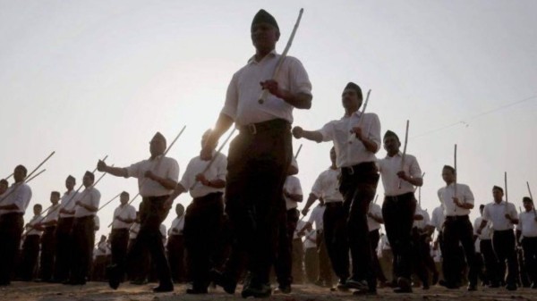 The PDO employee was seen dressed in the RSS uniform and carrying a stick during the event.