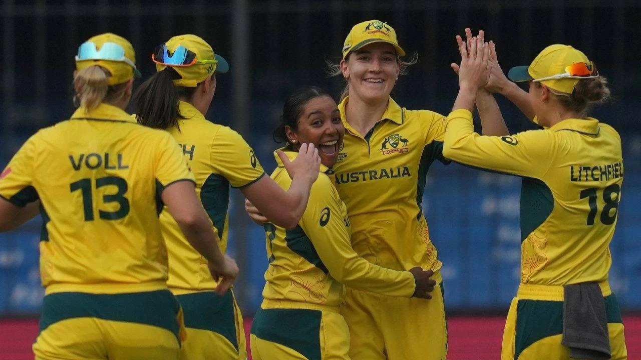 Australia&#039;s Annabel Sutherland, second from right, and Australia&#039;s Alana King celebrates the wicket of England&#039;s captain Nat Sciver-Brunt during the ICC Women&#039;s Cricket World Cup cricket match between England and Australia at Holkar Cricket Stadium in Indore.