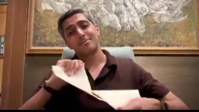 Ali Tareen tearing up PCB notice.