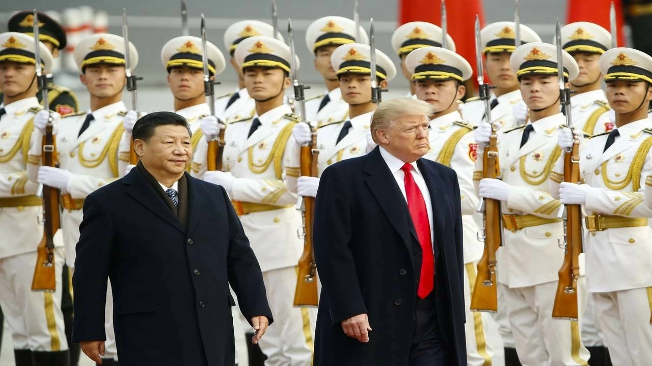 US President Donald Trump takes part in a welcoming ceremony with China's President Xi Jinping on November 9, 2017 in Beijing, China. He will be meeting his Chinese counterpart in-person for the first time during his second term as President. (Photo by Thomas Peter-Pool/Getty Images)