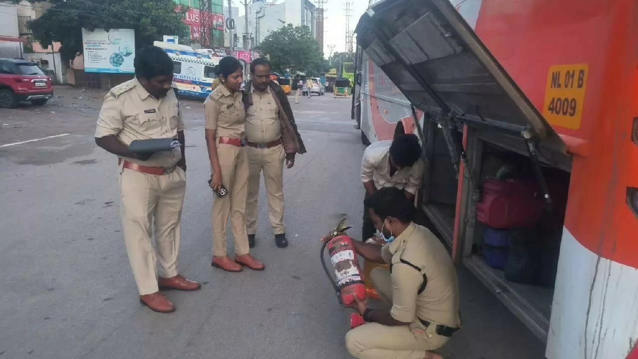 Police carry out checks on private travels bus in Hyderabad. 