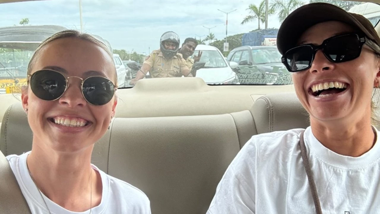 Ash Gardner's partner, Monica, shared a picture of police officials escorting them.