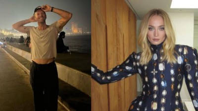 Chris Martin spotted with Sophie Turner in London.