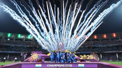 Indian women&#039;s cricket team celebrate with the World Cup trophy