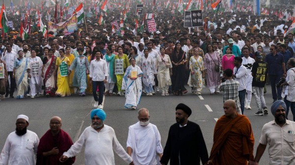 Mamata Banerjee and Abhishek Banerjee and other party leaders takes part in a protest rally against SIR in Kolkata on Tuesday