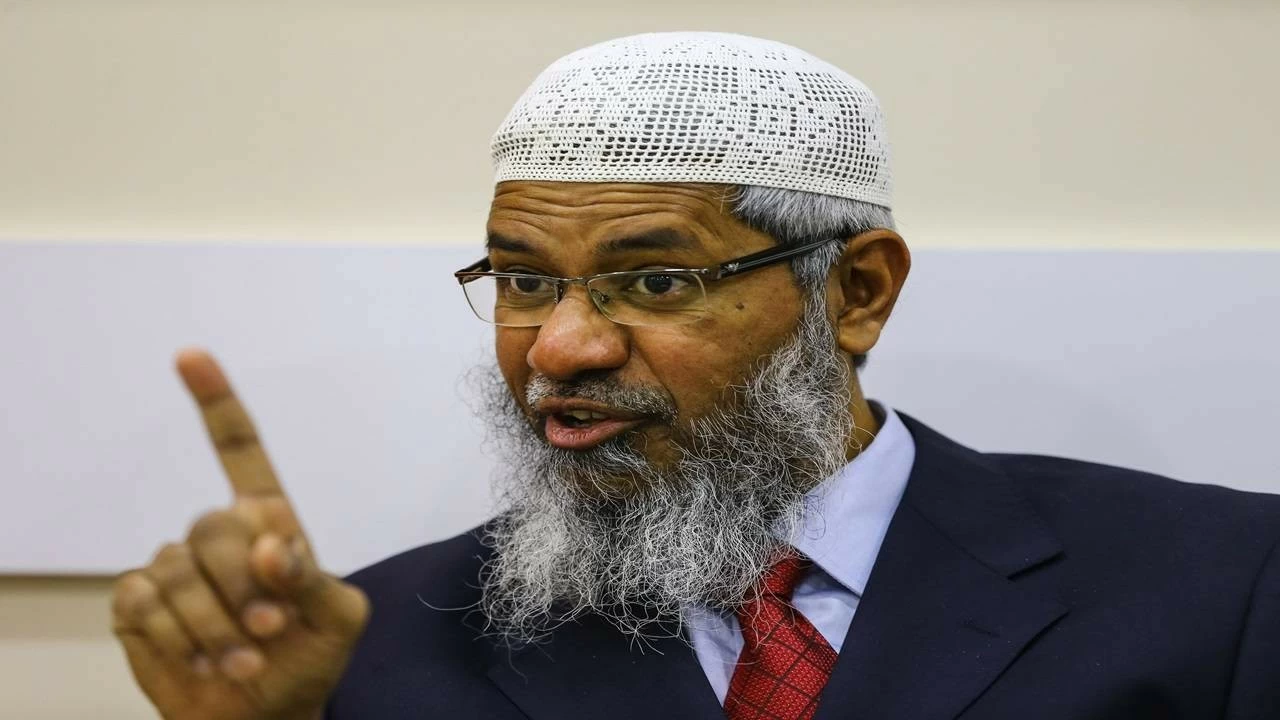Naik continued to remain wanted in India by on charges of encouraging communal hatred and delivering controversial sermons. (Salih Zeki Fazlioglu/Anadolu Agency/Getty Images)