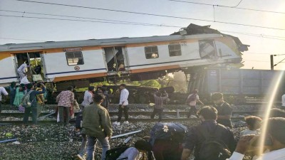 People gather after a passenger train collided with a goods train near Bilaspur railway station in Chhattisgarh on Tuesday. (Photo: PTI)